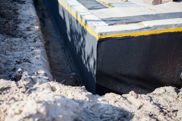 Professional Emergency Waterproofing technician working in Winnebago, IL